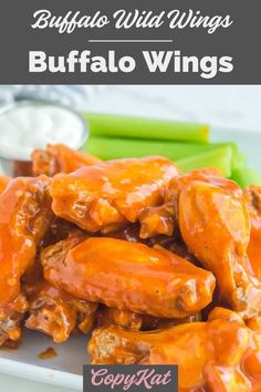 buffalo wings on a plate with celery and ranch dressing in the background text reads buffalo wild wings buffalo wings