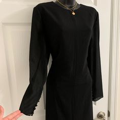 Ursula Of Switzerland Womens Black Dress Button Long Sleeve, Nice Dress For Cocktail Or Party. Measurements: Bust: Approx. 21 Inch. Waist: Approx. 18.5 Inch. Hips: Approx. 21 Inch. Length: Approx. 42 Inch. Nwt. Please See Photos! Thank You For Looking! Black Dresses With Side Buttons For Work, Black Dress With Side Buttons For Work, Black Workwear Dress With Side Buttons, Black Evening Dresses With Button Closure, Formal Dresses With Side Buttons, Long Sleeve Dresses With Button Back For Work, Long Sleeve Button Back Dress For Work, Black Button-back Dress For Work, Fitted Formal Dress With Side Buttons