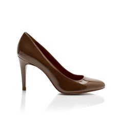 Free shipping and returns A truly sophisticated classic - if you are channeling Olivia Pope or Issa Dee this shade should match up quite nicely. Kerry Washington, Taraji P. Henson, right this way! We made a nude pump for black women.  Nude I: Our darkest shade is a warm, chocolate brown. On Fit: The pump runs fairly tr Brown Court Shoes For Office In Fall, Sleek Brown Heels For Formal Occasions, Sleek Brown Formal Heels, Brown Fall Court Shoes With Reinforced Heel, Brown Court Shoes With Reinforced Heel For Fall, Brown High Heel Court Shoes For Fall, Brown 4-inch Heels For Workwear, Brown Pointed Toe Court Shoes Medium Width, Brown Almond Toe Court Shoes For Fall