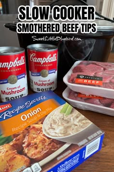 the ingredients for slow cooker smothered beef tips are displayed on a table