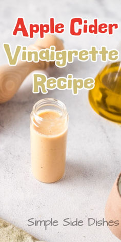 an apple cider vindigreette recipe with spoons and jars in the background