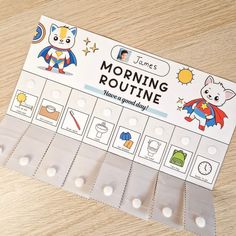 an unopened pack of morning routine cards on a wooden table with stickers