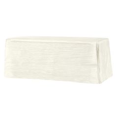 a white table cloth on top of a wooden block