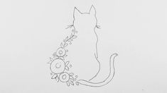 a black and white drawing of a cat with flowers