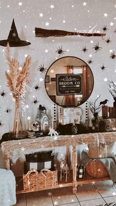 a room decorated for halloween with decorations on the wall and stars in the sky above