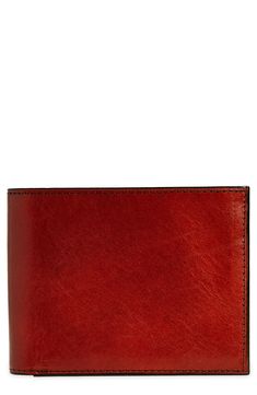 Hand-stained, vegetable-dyed Italian leather elevates a smart wallet with a fold-out ID window. Interior ID window; currency pouch; eleven card slots Leather Imported Men's Furnishings Leather Bifold Wallets For Formal Occasions, Formal Bifold Wallets With Leather Lining, Red Leather Trifold Wallet For Formal Occasions, Formal Cognac Wallet With Coin Pocket, Cognac Leather Wallet With Rfid Blocking, Formal Cognac Wallet With Card Slots, Classic Trifold Leather Wallet In Cognac, Business Cognac Bifold Wallets, Classic Leather Trifold Wallet In Cognac