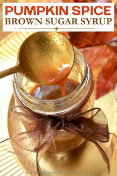 pumpkin spice brown sugar syrup in a jar with a spoon