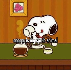 snoopy is my spirit animal with coffee in front of him and the caption reads, snoopy is my spirit animal