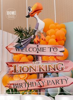 there is a sign that says welcome to the lion king birthday party with an image of a pelican on it