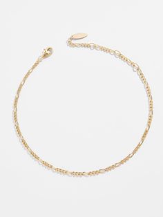 BAUBLEBAR FINE COLLECTION: Wear your favorite chain styles head-to-toe! Our best-selling Figaro Chain is now available in anklet form. It's the perfect piece for warm weather dressing and just a hint of shine. Plus, it's crafted from 14K gold plated sterling silver, preventing tarnishing. SHOP THE ENTIRE FINE COLLECTION HERE SHOP THE ENTIRE ANKLET COLLECTION HERE Minimal Bracelet, Coastal Granddaughter, Gold Link Chain, Gold Anklet, Figaro Chains, Figaro Chain, Engraved Jewelry, Gold Plated Sterling Silver, Making Money