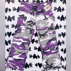 New With Tags!! Purple Camo Pants Bought At Zumiez A Few Years Ago And Have Never Worn Them. Not My Style Anymore So I Am Looking To Sell Them To Someone Who Will Appreciate Them ! Smoke Free Home Don’t Be Afraid To Make An Offer! If You Have Any Questions Don’t Hesitate To Ask! Streetwear Purple Pants With Pockets, Purple Streetwear Pants With Pockets, Trendy Purple Cargo Pants With Pockets, Trendy Purple Wide Leg Cargo Pants, Trendy Purple Pants With Pockets, Casual Fitted Lavender Pants, Trendy Purple Cotton Pants, Fitted Purple Y2k Bottoms, Purple Camo Pants