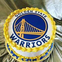 a golden state warriors cake on a silver sheet