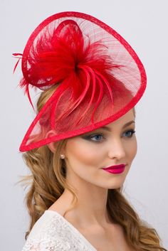 This mesh twist fascinator accessory is both daring and elegant, and stunning from every angle. This statement-making fascinator headband rises to any occasion. Adjustable Red Fascinator With Short Brim, Red Adjustable Fascinator, Red Adjustable Short Brim Fascinator, Fitted Red Top Hat For Spring, Red Fitted Top Hat With Short Brim, Fitted Red Top Hat For Kentucky Derby, Adjustable Red Top Hat For Kentucky Derby, Red Adjustable Top Hat For Kentucky Derby, Red Hat Fascinator For Races