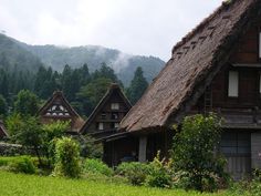 an old thatched roof house in the mountains