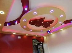 the ceiling in this room is decorated with lights