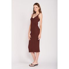 This midi knit dress from Emory Park is a must have this Fall. Made in a lightweight, stretch fabric for comfort wear all day . Features wide straps, a V-neckline and a fitted silhouette. Pair with heels and a jacket for the perfect outfit around town! For a more casual look, pair with tennis shoes and a denim jacket. Brown V-neck Ribbed Dress, Casual Seamless V-neck Dress, Ribbed V-neck Midi Dress For Date Night, Stretch Brown V-neck Midi Dress, Brown Stretch V-neck Midi Dress, Spring Date Night Seamless Dress, Elegant Seamless Midi Dress For Summer, Elegant Seamless Summer Midi Dress, Chic Seamless Midi Dress