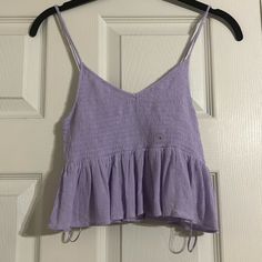 This Top Is The Ultimate Girly Cute Top. The Tight Top With The Flowy Bottom Is Soooo Flattering On Any And All Body Types!! Trust Me You Will Love This Pick For You Or Your Daughter. -Adjustable Straps (Seen In Last Pic) -New With Tags -100% Viscos Trendy Purple Top With Spaghetti Straps, Trendy Purple Spaghetti Strap Top, Casual Purple Camisole Top, Purple Top With Adjustable Straps For Summer, Purple Cotton Spaghetti Strap Tops, Casual Purple Spaghetti Strap Top, Casual Purple Tank Top For Day Out, Spaghetti Strap Top, Strap Top