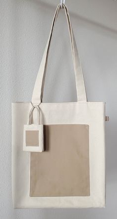 "This beautiful eco-friendly tote bag would be perfect for work, school, grocery shopping, picnic, traveling, and carrying your all thing everyday use. -Meticulously handcrafted, the heavyweight canvas tote comes in medium size with a comfortable carrying handle, a squared bottom, and an outside pocket for holding keys and smartphones. *Main fabric: 100% cotton heavyweight canvas. *Inner & Pocket fabric: 100% cotton medium-weight canvas.  *Dimensions:  -Regular Size: 14\"x13\"x2\"  -Handle Height: 12 1/2 ** Opening promotion! All totes will come with a mini tote keychain for no additional charge! **" Japanese Canvas Bag, Sewing With Canvas Fabric, Bag Canvas, Fabric Totes, Carry Bag, Tote Bag Fabric, Tote Bag Size, Make Tote Bag, Tote With Pockets