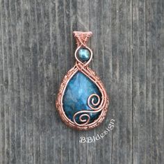 Wire wrapped Apatite pendant. Stone:  Apatite Bead:  Teal dyed Freshwater Pearl Wire:  copper Height: 1 5/8 inches / 4.2 cm Width:  7/8 inches / 2.2 cm Weight:  0.35 oz / 9.9 g Chain:  copper with lobster claw clasp If you choose 0 (zero) inch chain, pendant ships without a chain. For shipping to countries not listed, please contact me for prices. Bijoux Fil Aluminium, Wire Jewelry Designs, Wire Weaving, Teardrop Pendant, Wire Crafts, Wrapped Jewelry, Blue Teal, Copper Jewelry, Wire Wrap