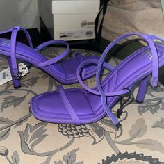 Never Worn Heels.Please See Pics Of Stained Areas On Heels.It Looks Like It Can Be Wiped Off Or Heels Can Be Cleaned. Size 40(Us9). Heel Height Looks Like A 3-3.5 Inch Elegant Purple Strappy Heels, Purple Strappy Evening Heels, Purple High Heel Sandals With Sculpted Heel, Purple Open Heel Shoes With Heel Loop, Purple Open Toe Heels With Sculpted Heel, Purple Ankle Strap Heels For Night Out, Purple Sculpted Heel Summer Heels, Spring Purple Strappy Heels, Trendy Zara Heels With Padded Heel