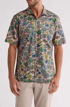 An artistic tropical trees print brings resort-ready appeal to a short-sleeve button-up shirt constructed from soft, breathable cotton. 29" length Front button closure Point collar Short sleeves Chest patch pocket 100% cotton Machine wash, tumble dry Made in the USA of imported fabric Spring Short Sleeve Camp Shirt With All Over Print, Cotton Camp Shirt With All Over Print For Vacation, Spring Cotton Camp Shirt With All Over Print, Green Short Sleeve Shirt With Palm Tree Print, Printed Pink Camp Shirt For Spring, Green Printed Short Sleeve Shirt With Camp Collar, Pink Tropical Top With Camp Collar, Short Sleeve Hawaiian Shirt With All-over Print For Spring, Pink Camp Collar Hawaiian Shirt For Spring