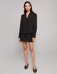 Black boxy 3 button suit jacket styled with matching skort . 100% polyester100% polyester lining Padded shouldersFaux front pocketsSize S/M bust 41"/106 cm Total length Model wears size s/m and is 5.9"/176 cmImported Single Button Blazer Dress For Career, Professional Tailored Single Breasted Skirt Suit, Professional Single-breasted Skirt Suit For Work, Notch Lapel Single Breasted Skirt Suit For Office, Single Breasted Notch Lapel Skirt Suit For Office, Chic Single Breasted Skirt Suit For Career, Chic Single-breasted Career Skirt Suit, Chic Single-breasted Skirt Suit For Career, Tailored Single-breasted Skirt Suit With Notch Lapel