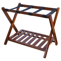 a wooden rack with black straps on it