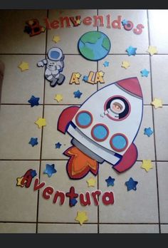 the children's room is decorated with colorful stars and an image of a rocket ship