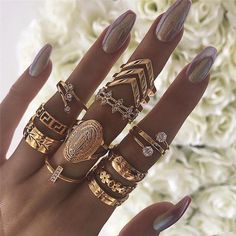 Discover Timeless Elegance with Our 13 Piece Medallion Ring Set! 💍✨ Elevate your accessory game and indulge in the epitome of sophistication with our 13 Piece Medallion Ring Set. Each ring is a masterpiece, meticulously crafted to enhance your style and add a dazzling touch to any ensemble. 🌟 Key Features: Exquisite Design: Adorned with Austrian crystals and coated in luxurious 18K gold plating, these rings shimmer with unmatched brilliance, making them the perfect addition to your jewelry collection. Durability Guaranteed: With a precision of 0.15" and crafted to last a lifetime, these rings are designed to retain their color and shine, ensuring they stay stunning through countless wearings. Hypoallergenic Excellence: Crafted from hypoallergenic materials, these rings are gentle on the Midi Ring Set, Ring Model, Wedding Bride Jewelry, Vintage Gold Rings, Boho Crystal, Knuckle Ring, Moon Ring, Trendy Ring, Set Style