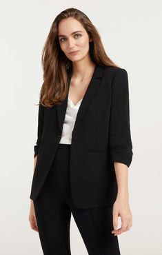 Look polished and professional in this Crepe Khloe Blazer. This expertly tailored piece features a collared neckline, notched lapels, and stylized sleeves for a look that is modernly classic. The classic black color will have you standing out with sophisticated style. Make a powerful statement with this must-have blazer. Details One button closureFabric: Drapey CrepeFaux front pocketsBack ventThree-quarter sleeves Content and Care 69% Triacetate 31% PolyesterDry Clean Only Imported Measurements Sleek Structured Blazer For Semi-formal Occasions, Elegant Office Blazer With Lapel Collar, Elegant Notch Lapel Blazer For Semi-formal Occasions, Elegant Semi-formal Blazer With Notch Lapel, Elegant Semi-formal Notch Lapel Blazer, Timeless Black Structured Blazer, Elegant Black Blazer With Lapel Collar, Timeless Black Formal Outerwear, Chic Career Suits With Lapel Collar