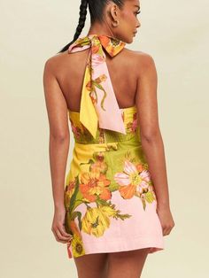 Add a burst of color to your wardrobe with our Floral Halter Mini Dress. This vibrant dress features a beautiful floral print in shades of yellow, pink, and green, making it perfect for summer outings. The halter neckline ties at the back, showcasing an elegant open-back design, while the front cutout adds a playful touch. Made from lightweight fabric, it ensures comfort and style all day long. Ideal for casual gatherings, beach trips, or garden parties, this mini dress is a must-have for your b Getaway Dress, Neutral Dresses, Bachelorette Party Dress, Vibrant Dress, Bachelorette Dress, Brunch Dress, Halter Mini Dress, Date Night Dresses, Sleeveless Rompers