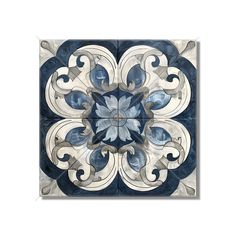 a blue and white tile with an intricate design