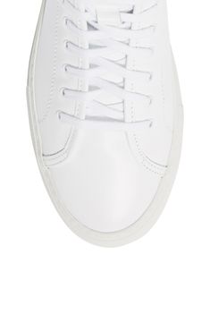 A streamlined high-top sneaker that doesn't shout, this leather kick is foil-stamped with factory ID and style codes for a look that's both sporty and smart. Style Name:Common Projects Tournament High Super Sneaker (Women). Style Number: 5636336. Classic White High-top Sneakers With Textured Sole, Classic White Leather High-top Sneakers, Classic High-top Sneakers With Perforated Toe Box, Modern White High-top Sneakers With Textured Sole, Classic High-top Sneakers With Boost Midsole And White Sole, Classic High-top Custom Sneakers With Perforated Toe Box, Classic High-top Custom Sneakers With Perforated Toe, Modern High-top Skate Shoes With Perforated Toe Box, Modern White Skate Shoes With Textured Sole