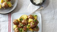 meatballs and pineapples are served with white rice