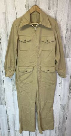 Good preowned vintage condition. There are no tags. Please see measurements in pictures. Not sure if mens or women’s. Seems like it could be for either. Zip front. Pockets on front. Big collar. Please see all pictures for details. Thanks for looking! Vintage Spring Workwear Overalls, Retro Workwear Jumpsuits And Rompers, Retro Style Workwear Overalls And Rompers, Vintage Jumpsuits And Rompers For Fall, Retro Workwear Overalls, Retro Long Sleeve Overalls For Work, Retro Spring Workwear Overalls, Vintage Long Sleeve Jumpsuits And Rompers For Work, Vintage Long Sleeve Jumpsuit For Work