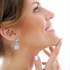 Add a touch of sparkle to your wardrobe with this versatile set of round and pear-shaped drop clip-on earrings. Featuring dazzling cubic zirconia stones set in elegant rhodium plating, these earrings offer a blend of classic and contemporary design. Their easy-to-wear clip-on style makes them perfect for any occasion, whether you're attending a business lunch or enjoying a glamorous evening out. A must-have accessory for anyone who appreciates a bit of sparkle and sophistication. Avoid contact w Business Lunch, August Birthstone Jewelry, July Birthstone Jewelry, Gifts For New Mums, Pearl Jewellery Earrings, Velvet Pouch, Jewelry Ring Box, Men's Jewelry Rings, August Birth Stone