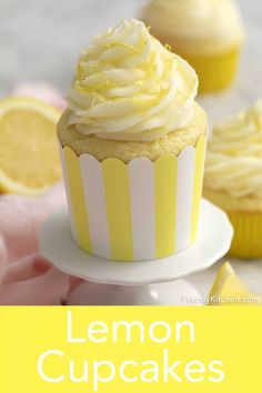 lemon cupcakes with white frosting on a plate