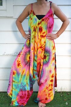 "💥One Size Fits Most Comfortable Tie Dye Hippie Jumpsuits Rompers Pants, Hippie Dress, Wide Legs Jumpsuits, Festival Clothings, Summer Clothing, Harem Dress, Beach Wear 👉One-of-a-kind hand dyed rompers 👉Fabric: 100% Soft and Breathable Rayon 👉Adjustable Tie shoulders 👉Boho/Hippie /Festival/Beach/Tropical/Fancy/UniqueTheme 👉Jumpsuit Length: 48\" 👉Straps Length: 19\" 👉Bust up to 55\" 👉Hip up to 60\" 👉 Tie Dye Method 👉The back is identical to front pattern 👉Flowy open legs 👉One Size Fi Summer Bohemian Fitted Jumpsuits And Rompers, Fitted Bohemian Jumpsuits And Rompers For Summer, Fitted Bohemian Jumpsuits And Rompers For Beach, Cotton Jumpsuits And Rompers For Summer Festivals, Fitted Bohemian Jumpsuits And Rompers, Hippie Sleeveless Jumpsuits And Rompers For Spring, Bohemian Cotton Jumpsuits And Rompers For Summer, Bohemian Maxi Jumpsuits And Rompers For Spring, Flowy Bohemian Jumpsuits And Rompers For Summer