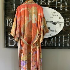 Darling Boutique Duster.  This darling kimono features a bohemian print and a flattering flowy fit.   Well made, optional belted waist.  Open kimono sleeves.  Brand: Boutique Bohemia Label  New bohemian boutique items just listed:  Check out my eBay Store!    Size: LARGE Pit to pit: 25 inches 54" from shoulder to bottom hem We ship super-fast from Washington State! Brand new with tags!   Combined Shipping Discount: Check out my other items up for auction at up to 80% off retail! Each additional Bohemian Boutique, Boho Tie Dye, Duster Jacket, Bohemian Print, Boho Kimono, Beach Covers, Kimono Sleeve, Top Dress, Women's Coats & Jackets