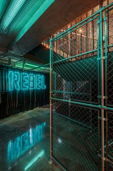 the inside of a jail cell with neon lights