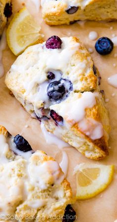 lemon blueberry scones with icing on a plate