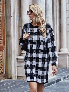 Our Kaitlyn Knit Dress comes in a black and white check print. It features long sleeves and round neck for a relaxed, comfortable fit that makes it perfect for layering during the cold winter months!! Size Guide: Julia is 5’6” tall, and has a 33.4” bust, 24.6”waist, & 37.2” hips. She is wearing a S / US 4 / AU 8. This knit dress is true to size. Material: 100% Acrylic. Key Features: Relaxed fit. Round neckline. Pull on style. Care Instructions: Machine wash / Cold hand wash Best Casual Dresses, Lantern Sleeve Sweater, Buffalo Plaid Pattern, Sweater Dress Outfit, Mini Sweater Dress, Lantern Sleeve, Lantern Sleeves, Buffalo Plaid, Plaid Pattern