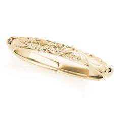 a white gold wedding ring with filigrees