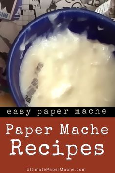 a blue bowl filled with white rice next to a pile of papers on top of a table