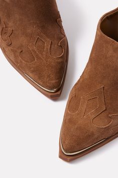 Designed with traditional Western styling, the Greta mules by Vince Camuto are crafted in soft brown suede and feature an angled stacked heel and pointed toe with a metal hardware detail. | VINCE CAMUTO Women's Greta Western Clog, Size 8.5, Brown Fall Closet, Sock Shop, Shoe Size Conversion, Boot Shop, Fall Shopping, Brown Suede, Stacked Heel, Vince Camuto, Jewelry Bags