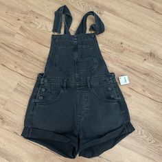 Brand New- Never Worn Size Xs Spring Black Overalls With Pockets, Black Spring Overalls With Pockets, Black Utility Denim Jumpsuit For Fall, Trendy Black Shortalls For Summer, Black Denim Overalls For Spring, Black Overalls With Pockets, Black Utility Overalls Romper, Black High-waisted Denim Overalls, Black Utility Overalls Jumpsuit