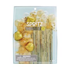 gold and white balloons in a package for a birthday or anniversary party with the words spritz on it