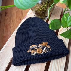 "Say hello to your new favorite hat! Not only are they made of recycled materials, but our beautifully textured rib knit beanies can be paired with any of the embroidery designs pictured above. The artwork is exclusive to LeBeau Denim Company; you won't find this hat anywhere else. We want to let you craft your perfect beanie; all you need to do is chose the embroidery design you want and we'll take care of the rest! If this hat isn't your favorite color, many more styles and colors can be found Winter Embroidered Cotton Hat, Winter Embroidered Beanie Hat, Black Embroidered Beanie Hat, Winter Embroidered Hat As Gift, One Size Embroidered Beanie Hats, Embroidered Beanie Cap One Size, Embroidered Beanie Cap, One Size, Embroidered Beanie Cap One Size Fits Most, Embroidered Beanie Cap, One Size Fits Most