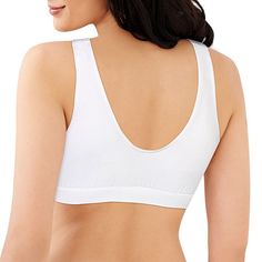 Silky bralette-style crop top with four-way stretch for all-day comfort. · Soft microfiber Cool Comfort fabric helps wick moisture and keep you cool and comfortable. · No hardware to chafe or dig, no itchy tag, only comfort. · Pullover styling. · Perfect leisure bra or sleep bra. · Create a matching set with our Comfort Revolution seamless microfiber panties. · Fabric: Nylon · Units per pack: 1Bra Type: Sleep, WirelessFeatures: Tag FreeClosure Type: Pullover HeadSupport: Light SupportFiber Conte White Cropped Seamless Sports Bra, Supportive White Seamless Sports Bra, White Sports Bra With Soft Touch, White Stretch Sports Bra With Soft Touch, Versatile White Seamless Crop Top, White Bra With Seamless Construction And Medium Support, Supportive White Seamless Bra, Supportive Seamless White Bra, White Micro-elastic Seamless Bra