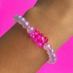 Adorable Jumbo Gummy Bear Shimmer Bracelet. Made using Hot Pink Acrylic Gummy Bear, 8mm Purple Shimmer acrylic beads, on 1mm durable elastic cord. You will receive (1) Bracelet ✨Sizing Siggestions✨ * Child 2-4yrs 5.0"   * Child 5-7yrs 5.5"  * Child 8-10yrs 6.0" (also fits XS Adult sz) * Adult S 6.5"  * Adult M 7.0" * Adult L 7.5" * Adult XL 8.0" * Adult XXL 8.5" check out my other gummy bear accessories, earrings, phone strap, phone charms!  free shipping at $35 If you have any questions, feel f Pink Bracelet Wristband For Birthday, Pink Wristband For Birthday, Adjustable Pink Kawaii Jewelry, Adjustable Pink Jewelry With Cute Design, Pink Novelty Bracelets For Party Favors, Kawaii Adjustable Pink Beaded Bracelet, Kawaii Adjustable Beaded Bracelets As Gift, Kawaii Pink Beaded Bracelets With Round Beads, Pink Novelty Wristband For Gift